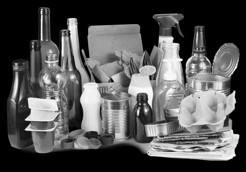 Rubbish removal trucks collecting household waste